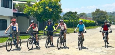 Carol Mckeever Cycling on the  tour with redspokes