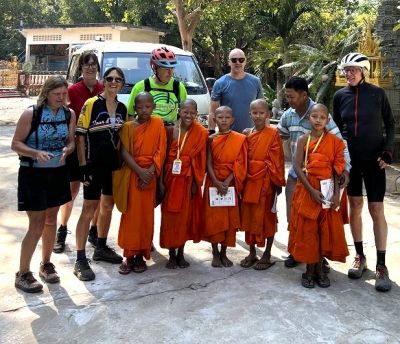 Angela White Cycling on the  tour with redspokes