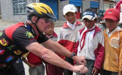 John Goveia Cycling on the  tour with redspokes